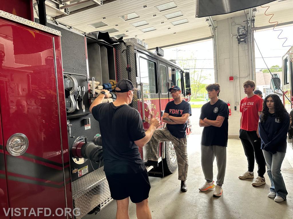 Captain Marc Baiocco showing how to stretch a 1-3/4&quot; hoseline off Engine 141 during &quot;Module 4 – Fire Scene Operations&quot; – 05/04/25