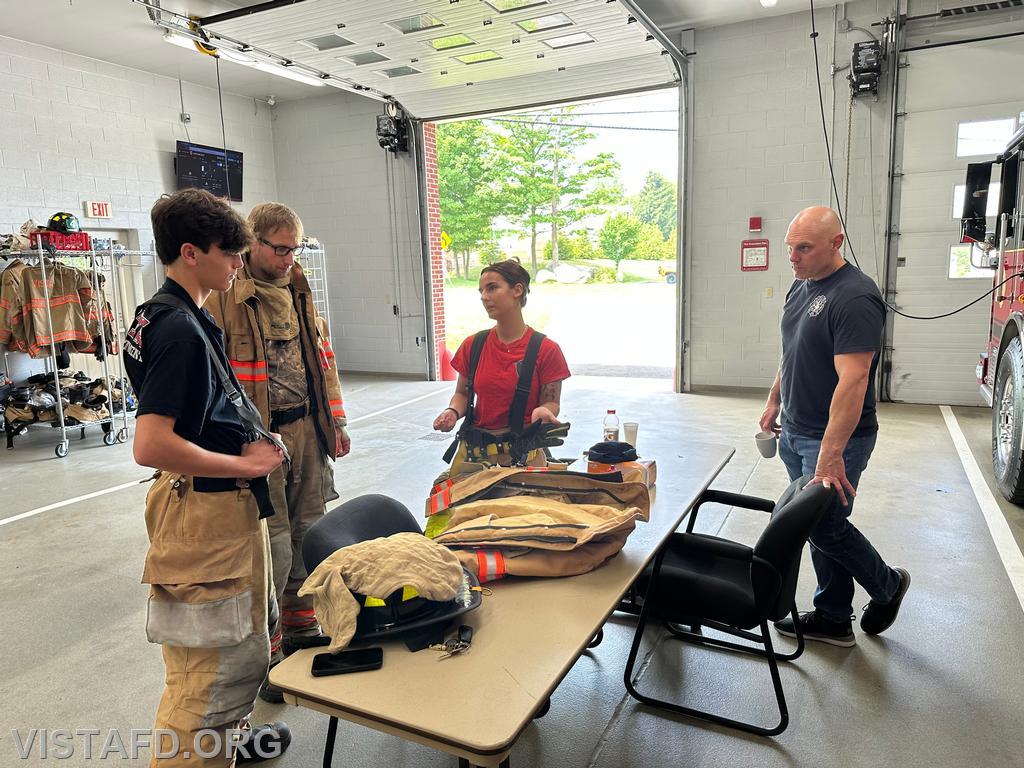 Foreman Kyla Whalen going over Firefighting gear during &quot;Firefighter Skills Class&quot; - 06/08/25