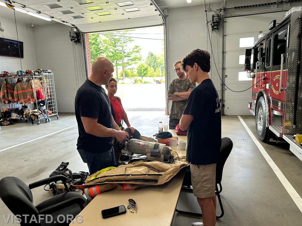 Captain Marc Baiocco going over Firefighting gear during &quot;Firefighter Skills Class&quot; - 06/08/25