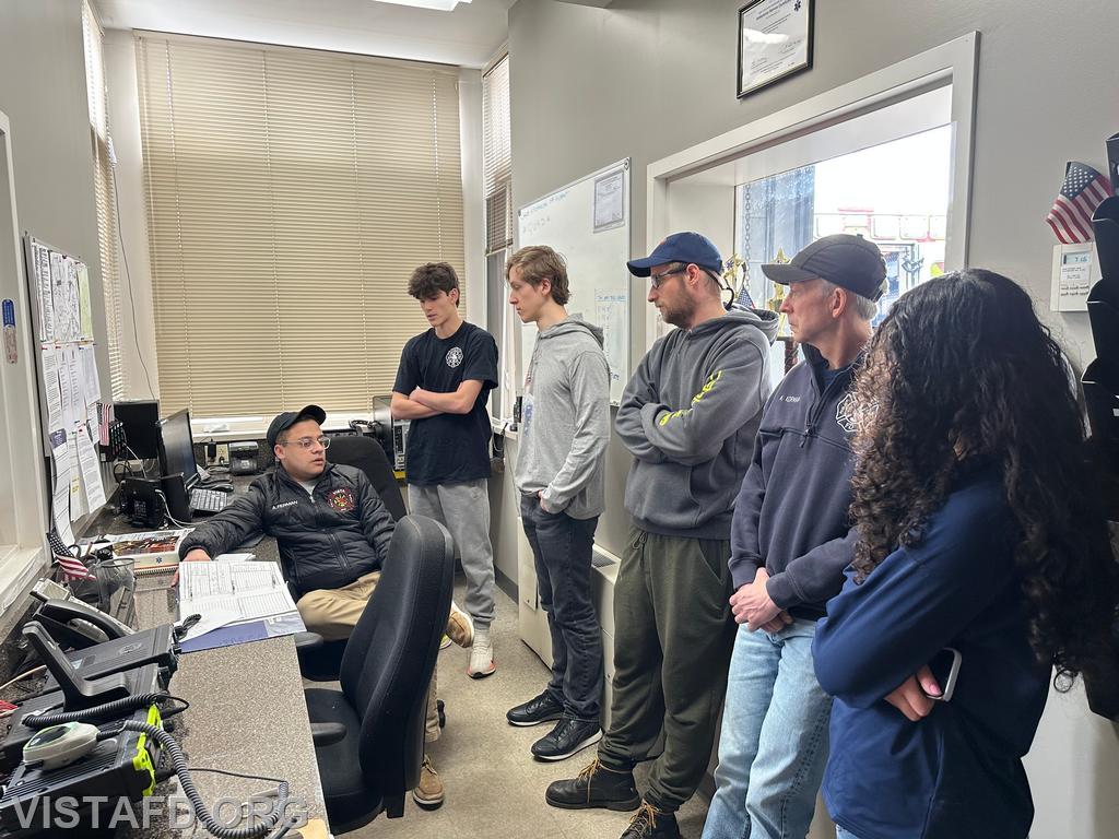 Firefighter Adam Ferman reviews the incident log in the Vista Firehouse radio room - 04/13/25