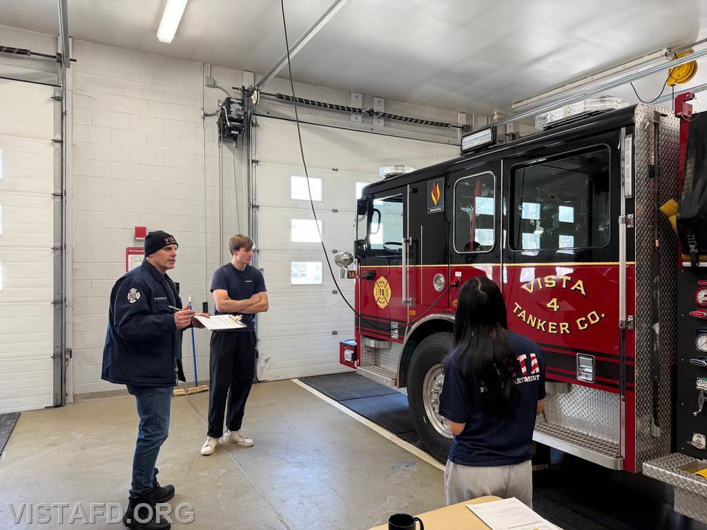 Captain Marc Baiocco going over safely mounting and dismounting apparatus during &quot;Firefighter Skills Class&quot; - 02/01/26