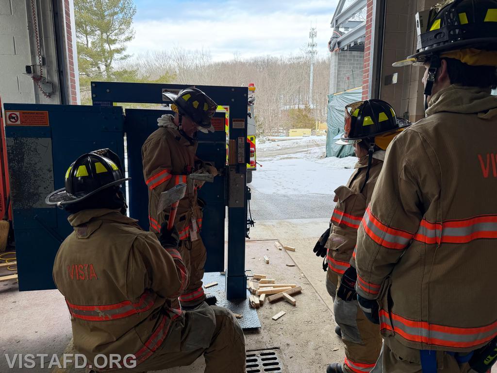 Firefighter Phil Katz reviews forcible entry techniques with members during &quot;Firefighter Skills Class&quot; - 03/01/26