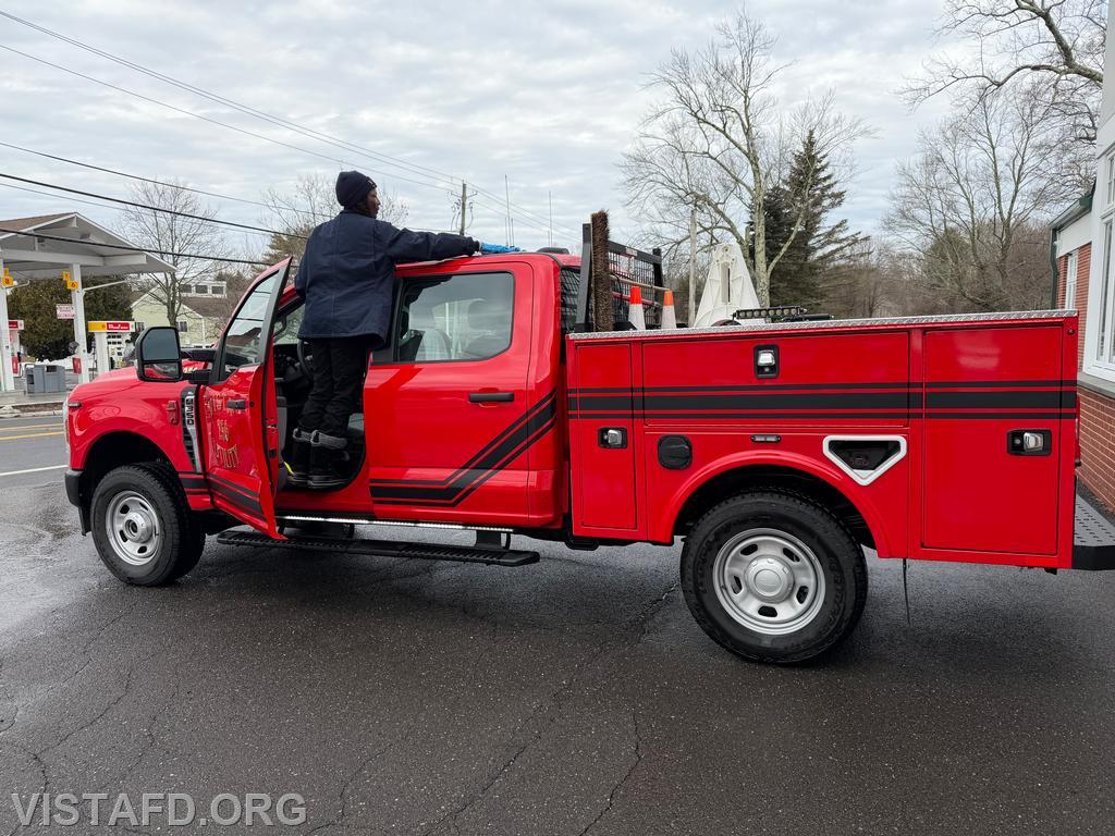 Firefighter Judith Le Gall cleaning Utility 256 following driver training - 03/08/26
