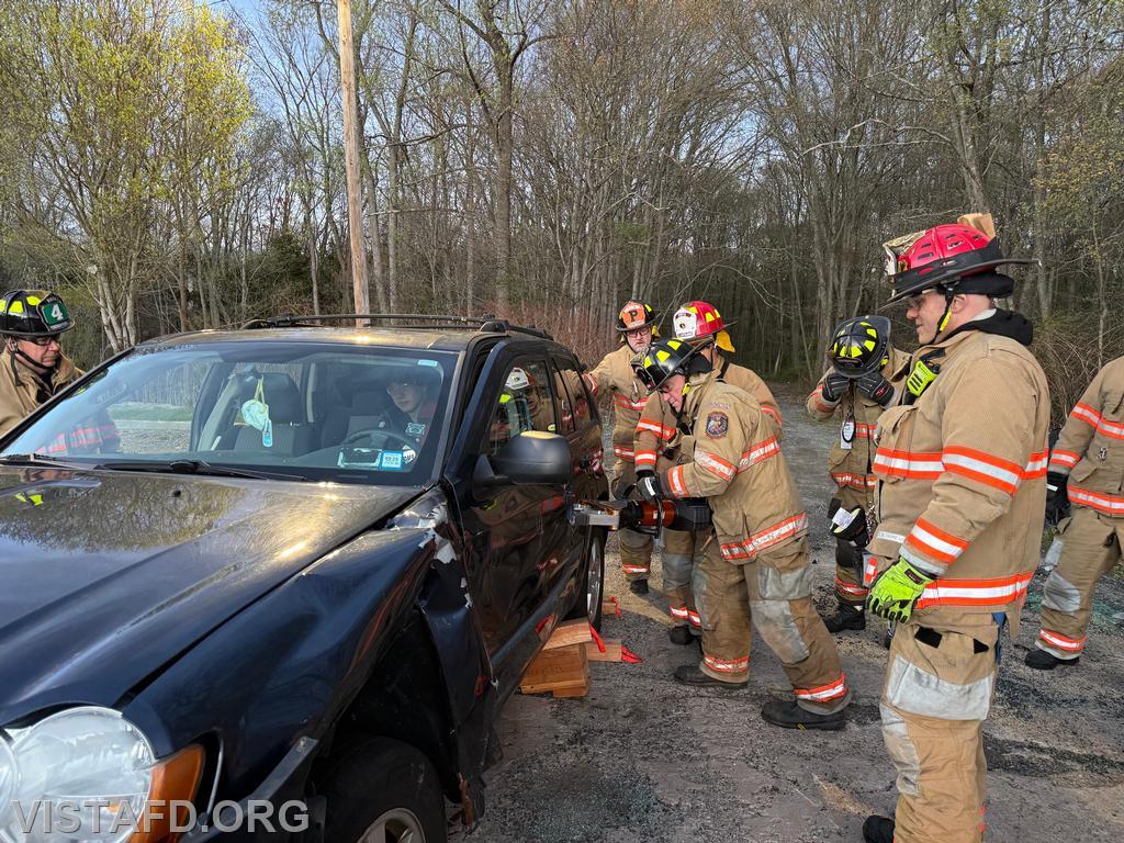 Firefighter Dan Hochman operates the hydraulic spreaders during the &ldquo;Extrication with Victim Removal &ndash; Doors and Dash Displacement&rdquo; drill &ndash; 04/20/26