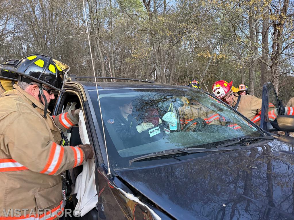 Vista Firefighters and EMS personnel coordinate patient removal during the &ldquo;Extrication with Victim Removal &ndash; Doors and Dash Displacement&rdquo; drill &ndash; 04/20/26