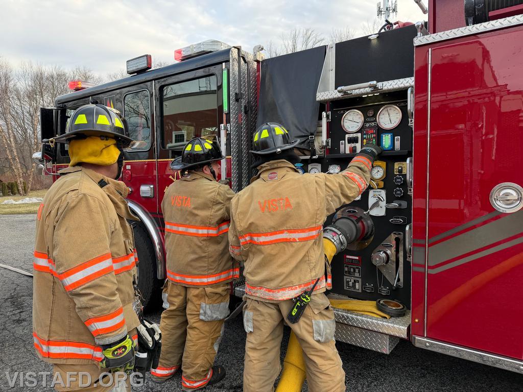 Foreman Brian Sferra, Firefighter Dan Hochman, and Firefighter Phil Wanderman operating the Engine 141 pump panel - 03/15/26