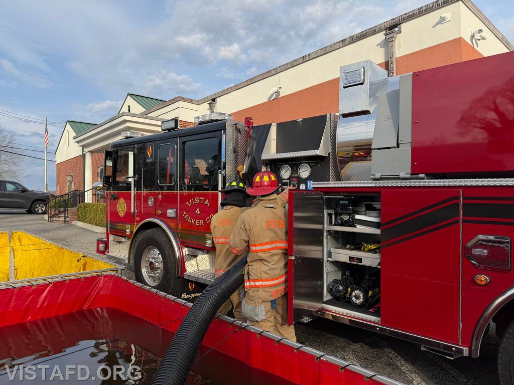 Firefighter Pietro Cipriano and Captain Brian Porco operating Tanker 4&rsquo;s pump panel - 03/15/26