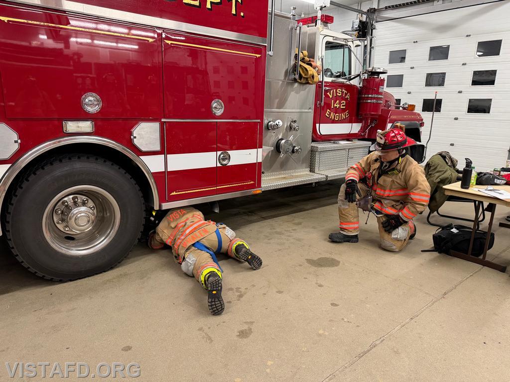Foreman Kyla Whalen practicing a low-profile SCBA maneuver as Captain Marc Baiocco looks on &ndash; 03/23/26