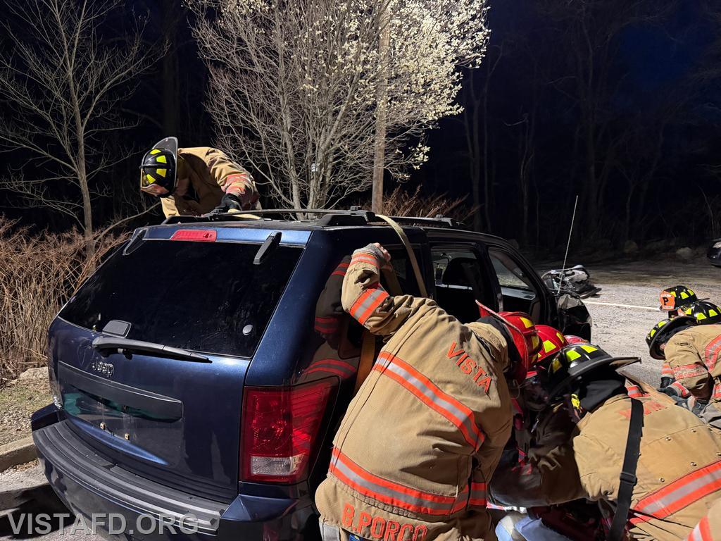 Vista Fire Department personnel conducting vehicle stabilization during extrication operations - 04/06/26