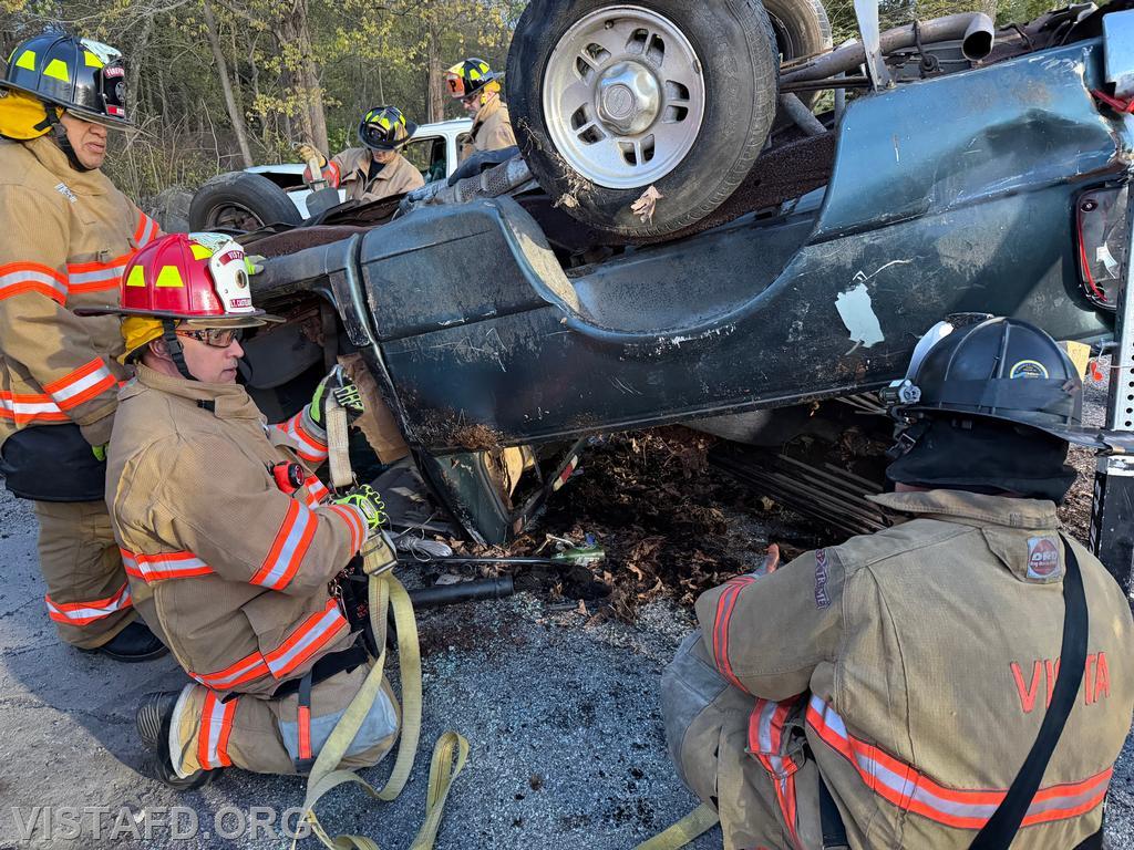 Firefighter Sean Kelly reviewing stabilization techniques with Lt. Dan Castelhano - 04/27/26