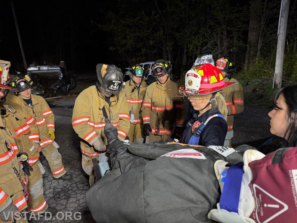Firefighter Sean Kelly demonstrating the use of a traction splint with Vista Fire Department personnel - 04/27/26