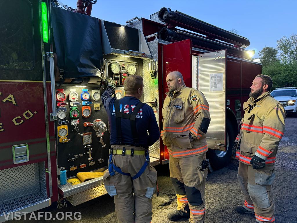 Lead Foreman Mike Peck reviewing the Engine 141 pump panel with Firefighter/EMT Ryan Huntsman and Probationary Firefighter Max Nierneberg during the &ldquo;Hydrant Service&rdquo; drill - 05/11/26