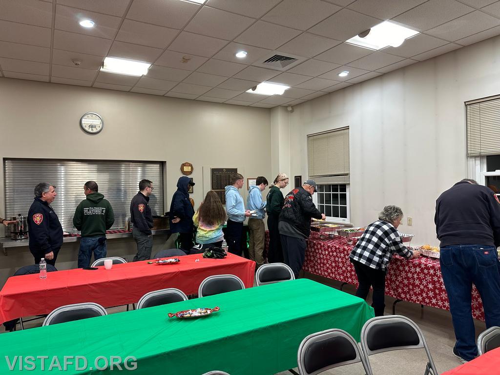 Vista Fire Department personnel enjoying dinner courtesy of the Vista Fire Department Auxiliary - 12/11/23