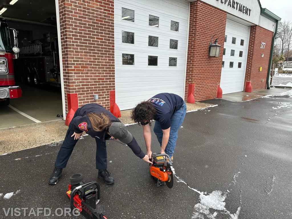 Foreman Kyla Whalen going over how to operate the chainsaw with Probationary Firefighter Franco Compagnone - 01/07/24