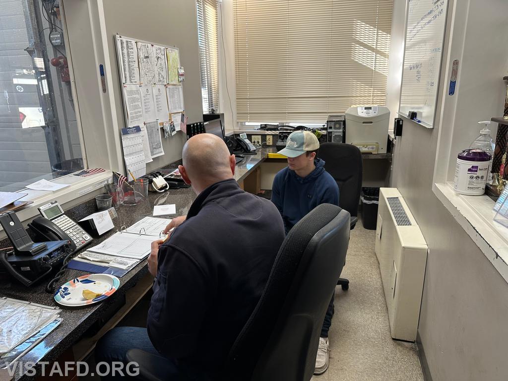 Captain Marc Baiocco going over the radio room with Probationary Firefighter Teddy Goetz during &quot;Firefighter Skills Class&quot; - 01/21/24
