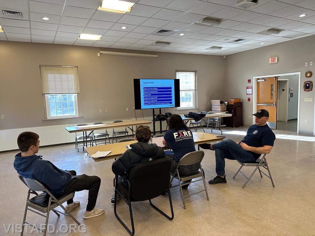Captain Marc Baiocco going over Firefighter Personal Protective Equipment (PPE) during &quot;Firefighter Skills Class&quot; - 02/04/24