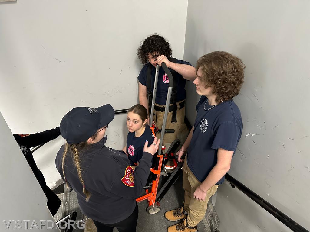Lead Foreman Elly Hersam going over how to use the stair chair - 03/11/24