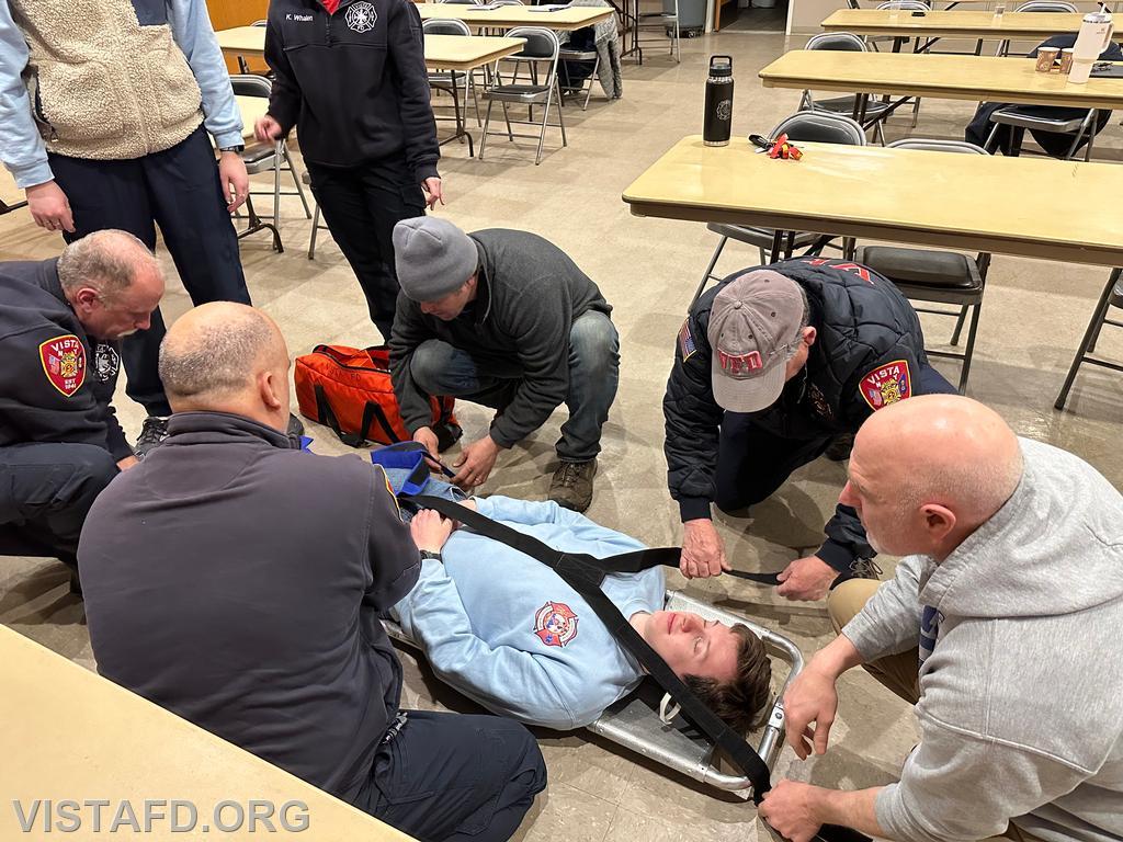 Vista Fire Department personnel practicing how to use the scoop stretcher - 03/11/24