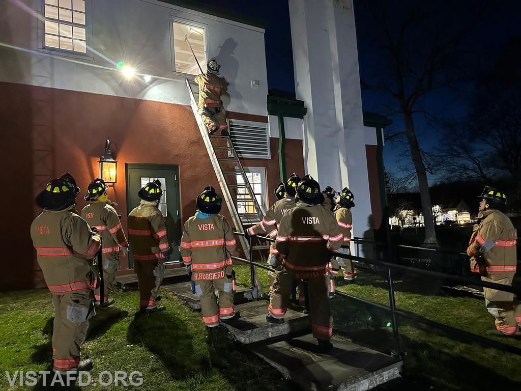 Assistant Chief Mike Peck going over how to ventilate a window while operating on a ladder - 03/18/24