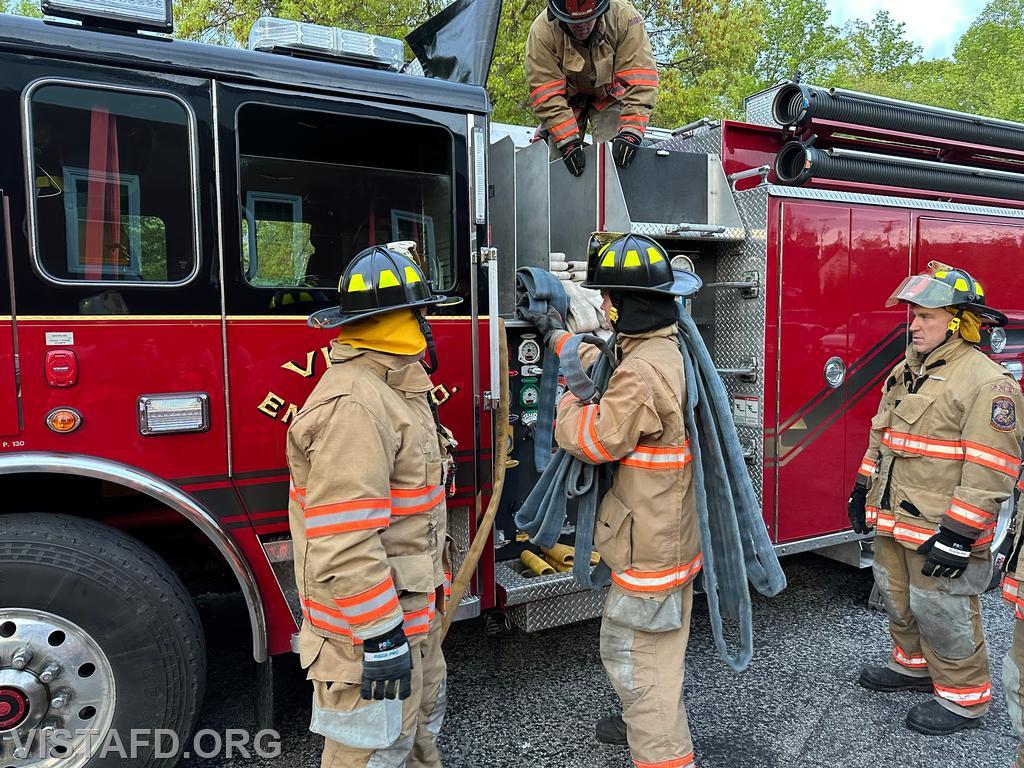 Probationary Firefighter Guillaume Pestie practicing how to stretch an 1-3/4&quot; hoseline - 05/13/24