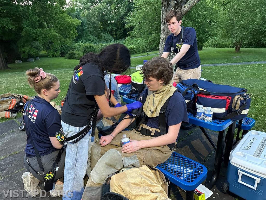EMT Savannah Phillips conducting rehab operations on Probationary Firefighter Ty Graygor - 06/17/24