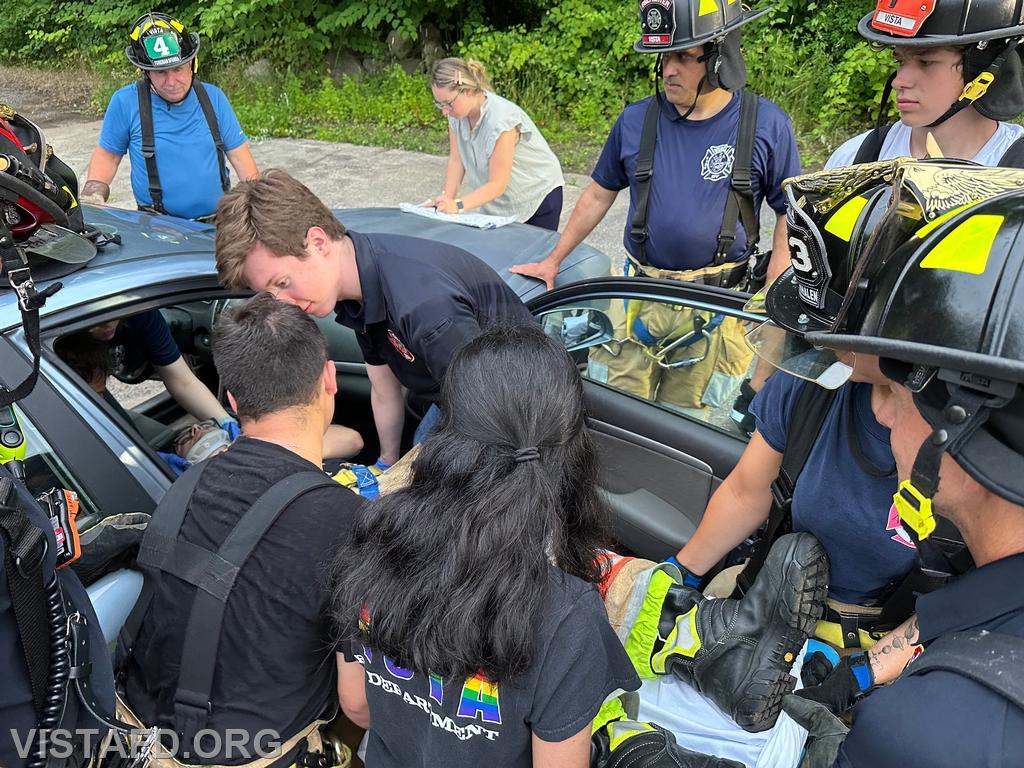 Vista Fire Department personnel practicing patient removal during a motor vehicle accident scenario - 07/22/24