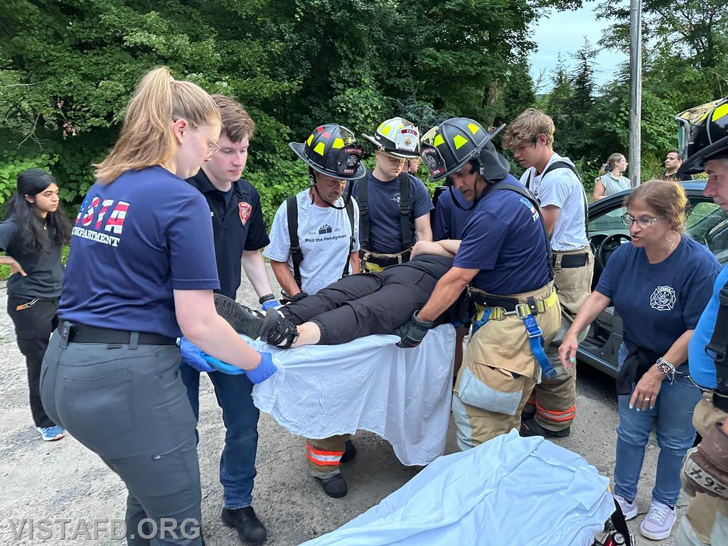 Vista Fire Department personnel practicing patient removal during a motor vehicle accident scenario - 07/22/24