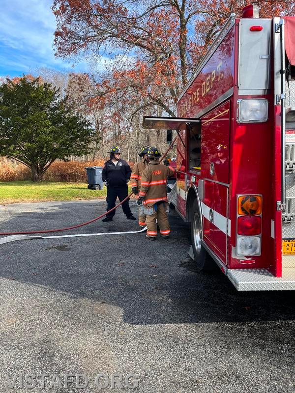 Firefighter Phil Katz going over how to operate the Engine 142 pump panel with Probationary FF/EMT Candidate Andrew Korman as Firefighter/EMT Ryan Huntsman looks on - 11/12/23