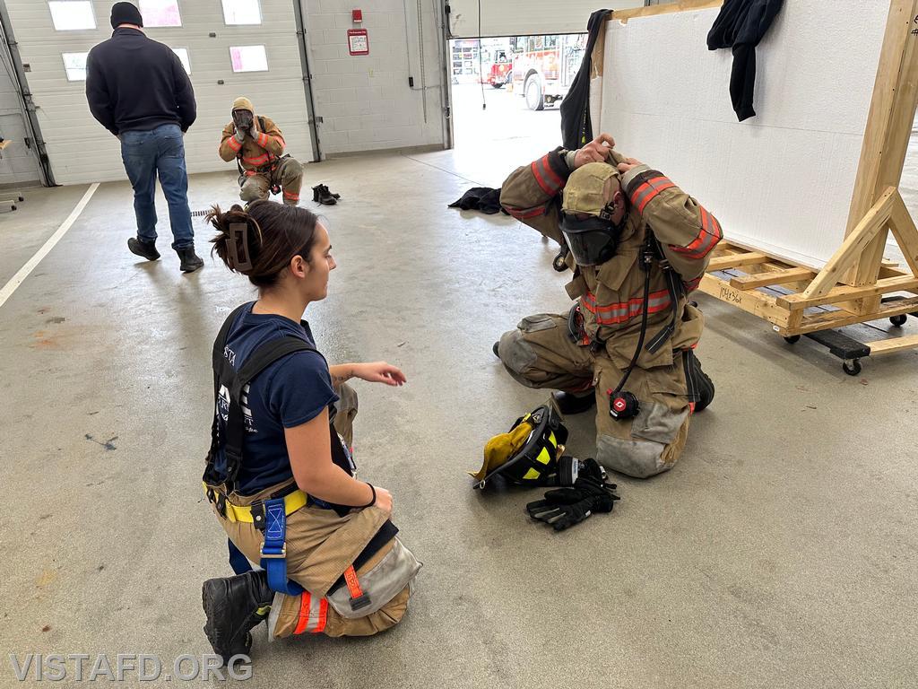 Foreman Kyla Whalen assists Firefighter Dan Hochman in practicing a &quot;2-minute drill&quot; - 01/19/25