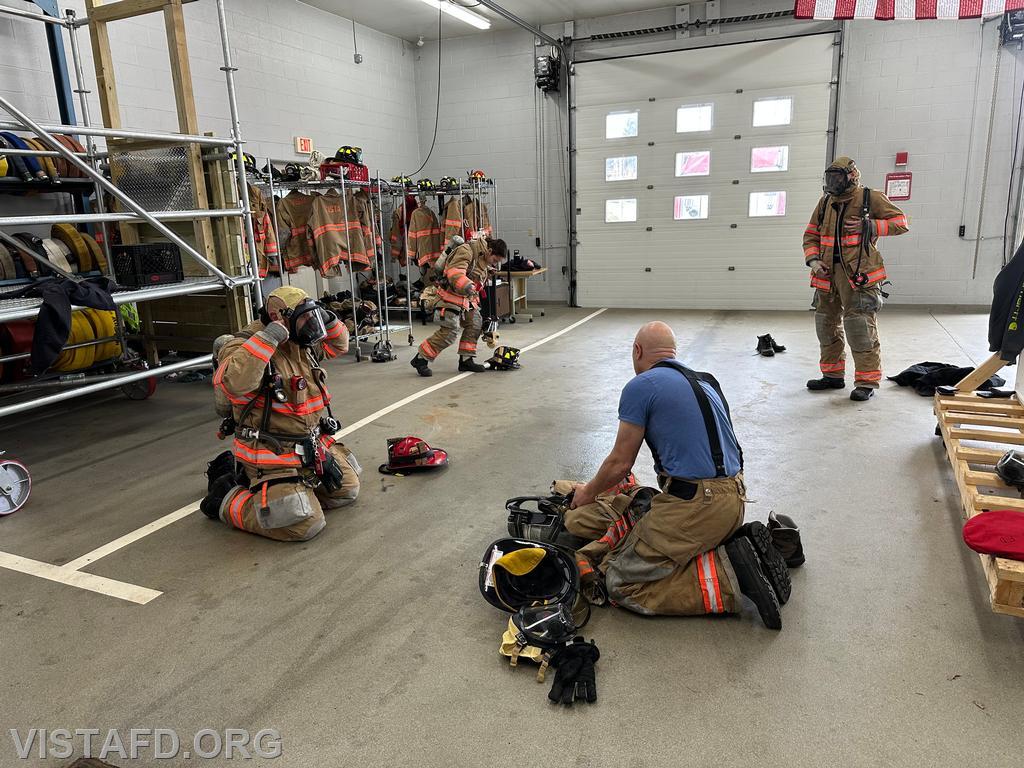 Captain Marc Baiocco and Foreman Kyla Whalen demonstrating the &quot;2-minute drill' to Firefighter Dan Hochman and Probationary Firefighter David Fignar - 01/19/25