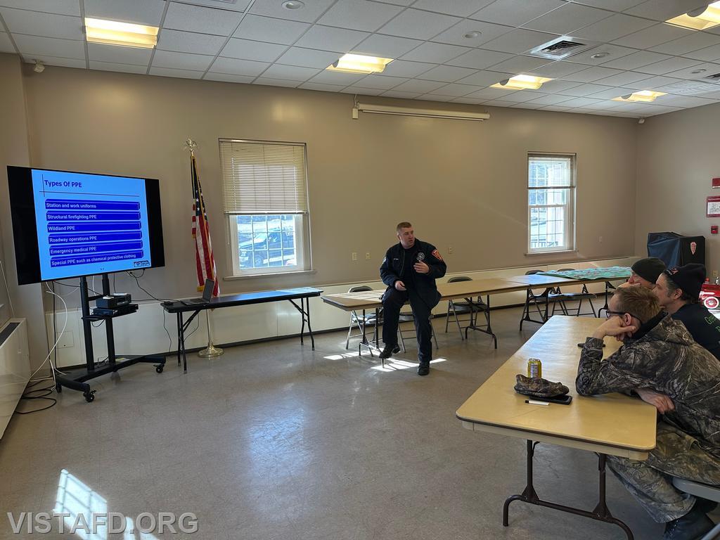 Lead Foreman Mike Peck reviewing Firefighter Personal Protective Equipment during the &quot;Firefighter Skills Class&quot; - 03/02/25
