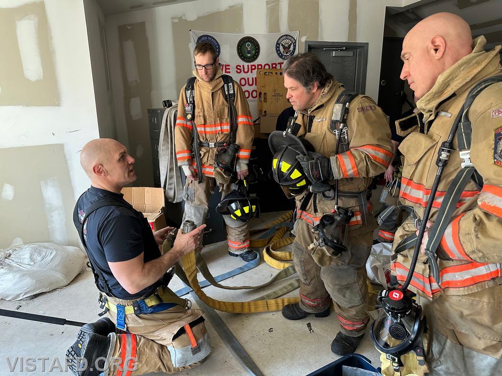 Captain Marc Baiocco reviewing V.E.I.S. (Vent, Enter, Isolate, and Search) procedures during the &quot;Firefighter Skills Class&quot; - 03/09/25