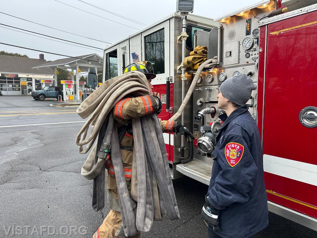 Firefighter Dan Hochman practices hoseline advancement off Engine 143 as Mutual Responder Dom Mangone observes - 03/16/25