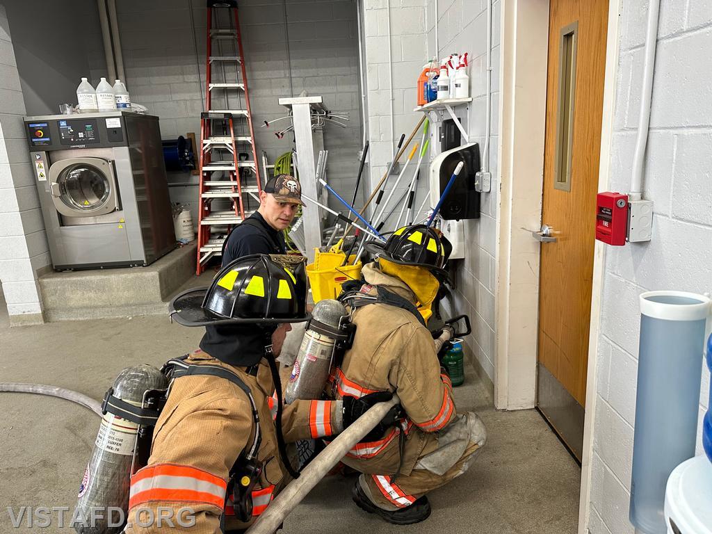 Captain Marc Baiocco goes over the hoseline advancement evolution with Firefighter Dan Hochman and Probationary Firefighter David Fignar - 03/16/25