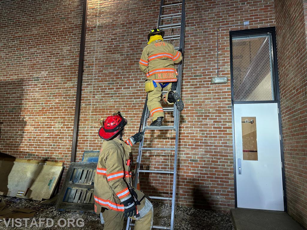 Firefighter Martin Rojas practicing a leg lock on a ladder - 03/31/25