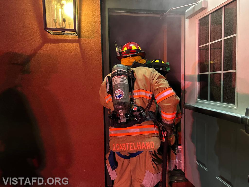 Lieutenant Dan Castelhano entering the smoke-filled structure during the &quot;Search and Rescue with Victim Removal&quot; drill - 04/07/25
