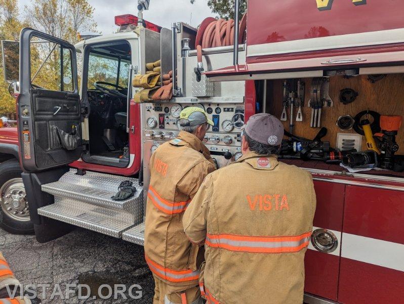 Probationary Firefighter/EMT Candidate Andy Korman practicing pumping Engine 142 with Foreman Brian Sferra - 10/22/23
