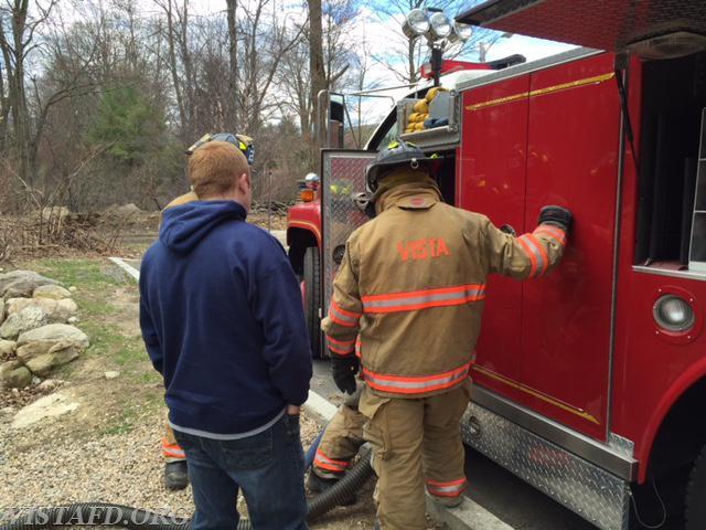 Lt. Mike Peck oversees pumping operations from Rescue 13