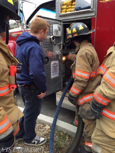 Lt. Mike Peck oversees pumping operations from Rescue 13