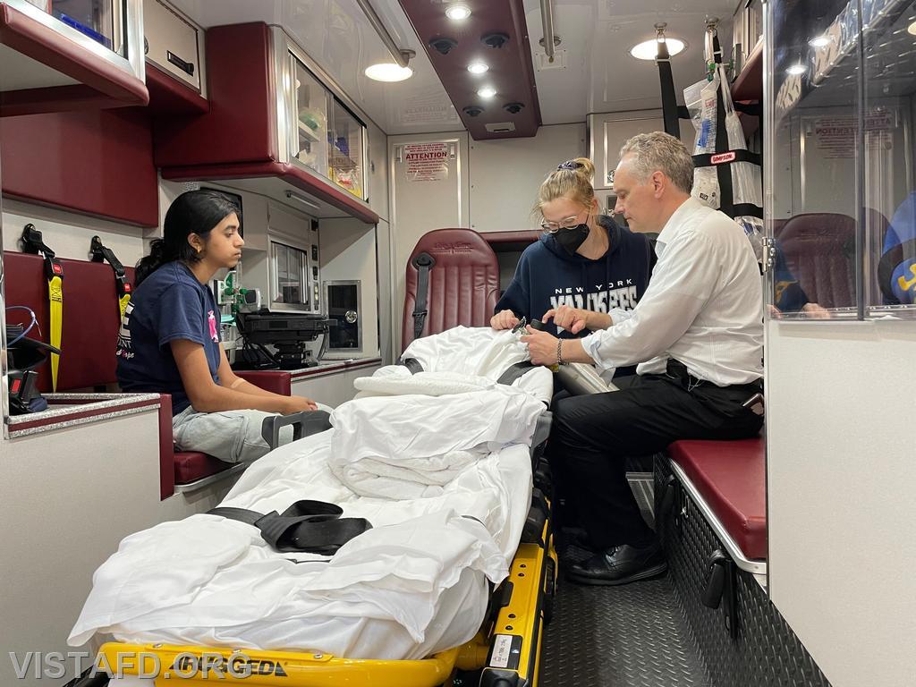 Foreman Isabel Fry going over equipment on Ambulance 84B1