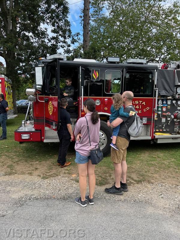 Vista Fire Department personnel giving tours of Engine 141 during the South Salem Library Fair