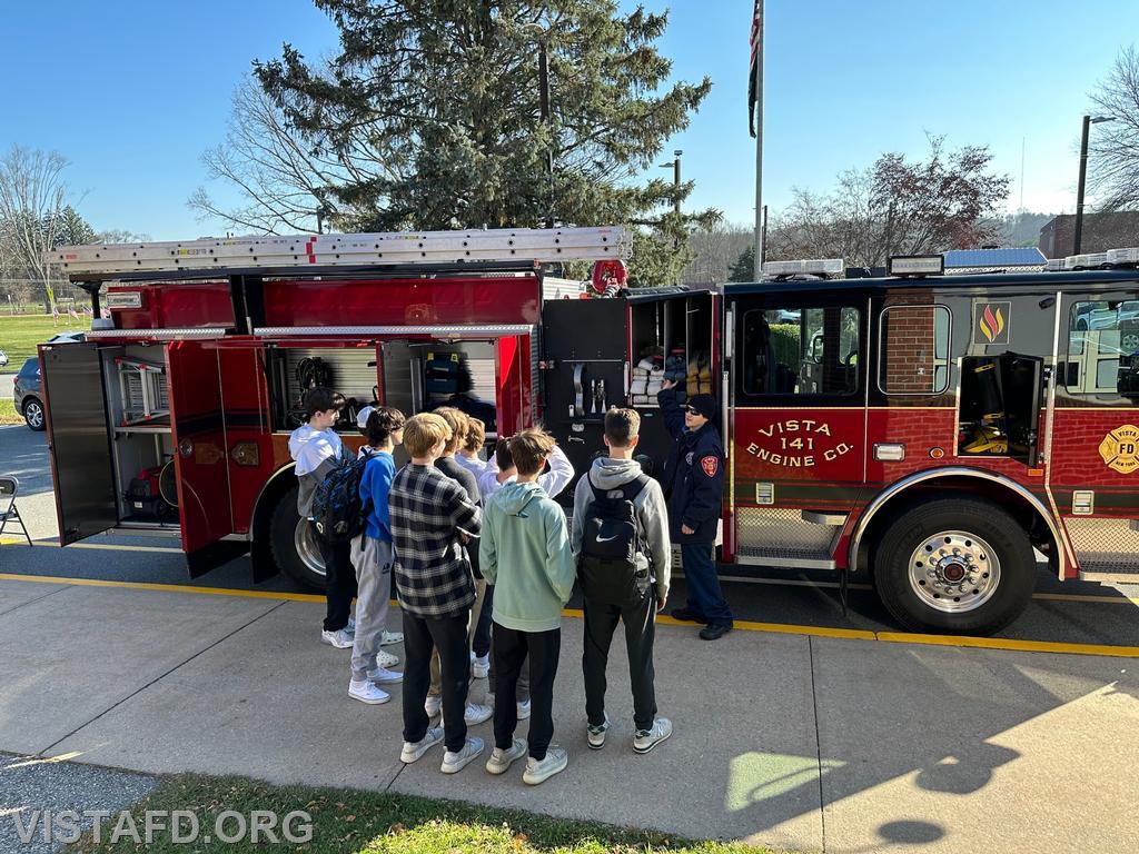 Firefighter Dom Mangone giving tours of Engine 141 to JJHS students