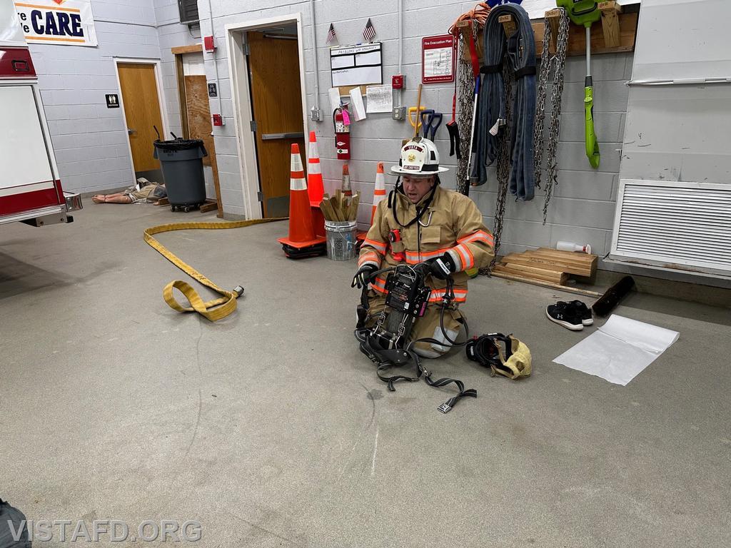 Assistant Chief Mike Peck going over the SCBA