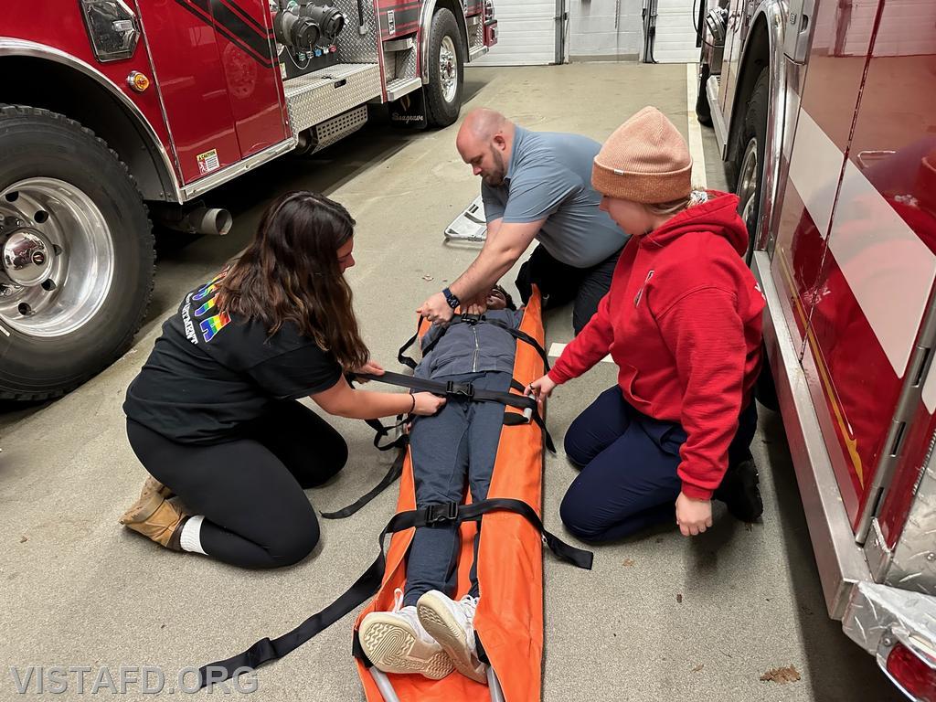 Vista Fire Department personnel operating the reeves stretcher