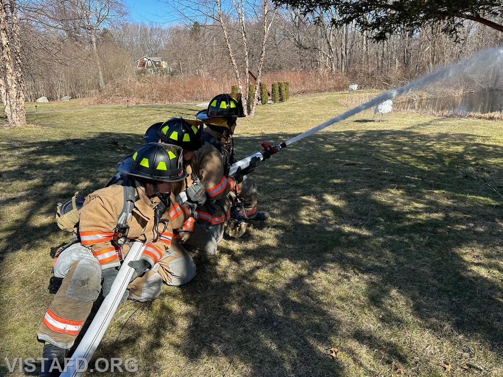 Vista Firefighters practicing how to operate a 2-1/2" hoseline
