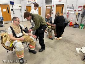 Vista EMS personnel conducting rehab operations on Vista Firefighters