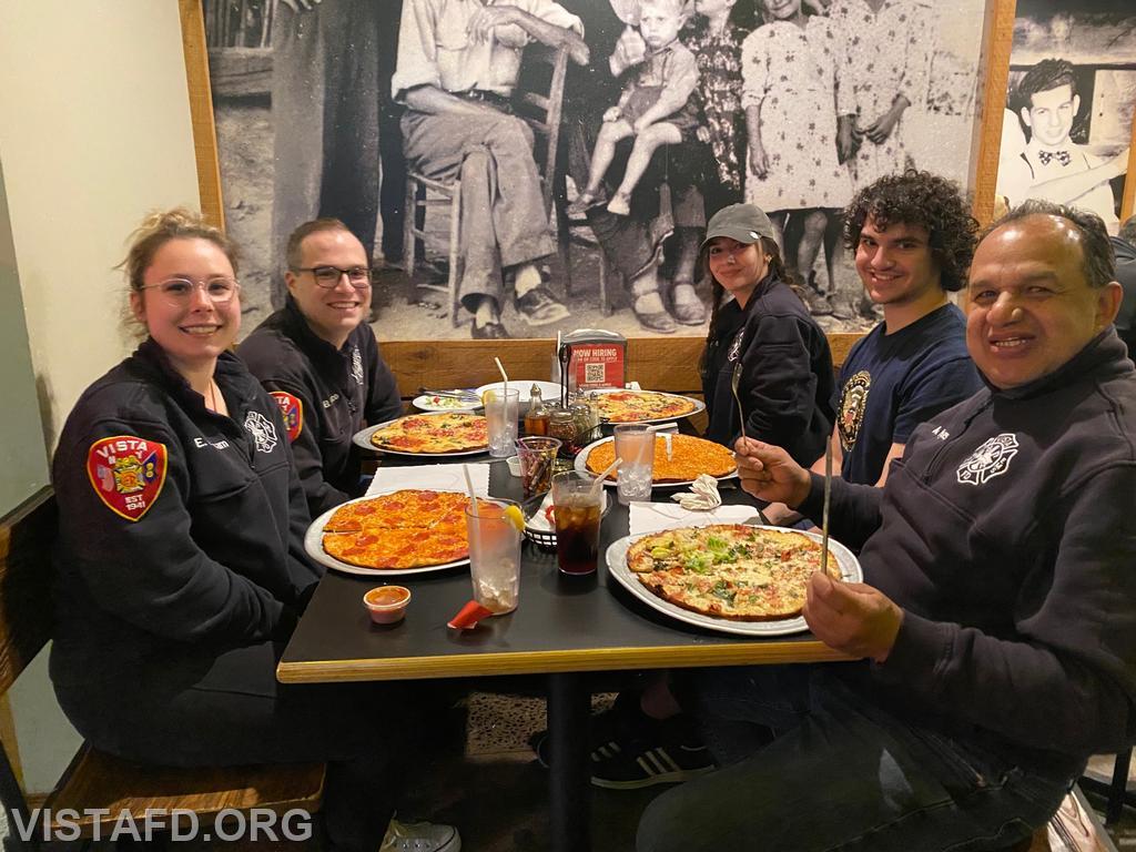Vista Fire Department personnel enjoying dinner at Riko's Pizza