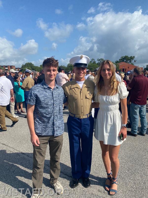 Vista Firefighter Finn Brannan with his family during his U.S. Marine Corps Graduation