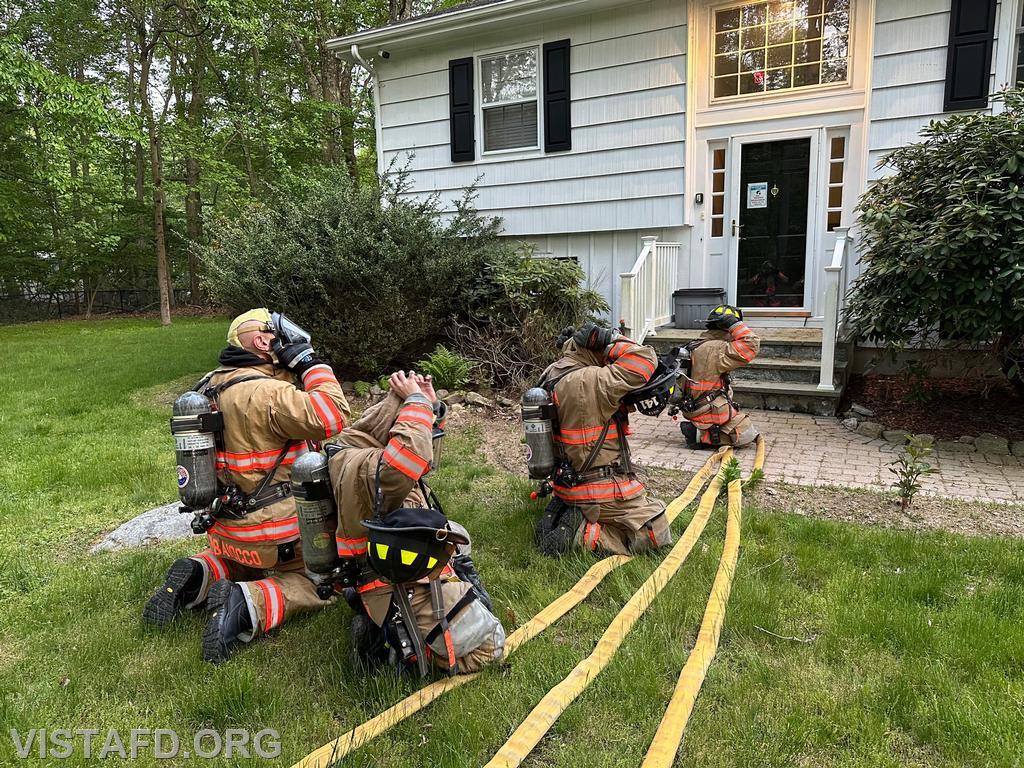 Vista Firefighters practice SCBA operations before entering the "structure fire"