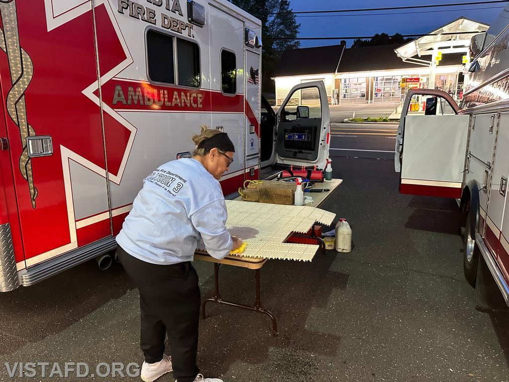 Foreman Leslie Smith cleaning Ambulance 84B2